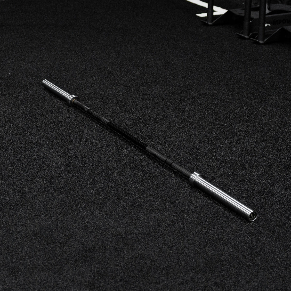 Platinum Olympic Lifting Barbell - Front view of commercial gym equipment
