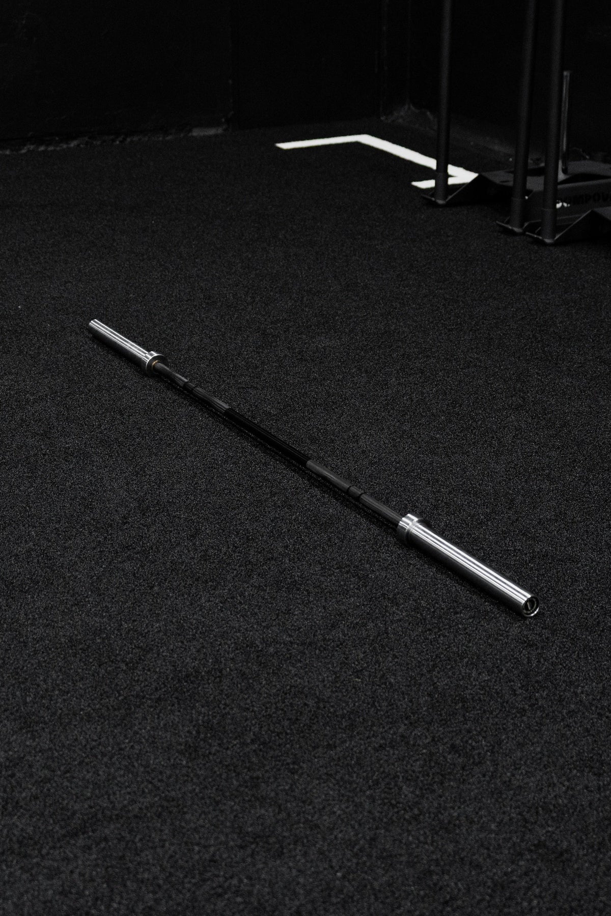 Platinum Olympic Lifting Barbell - Front view of commercial gym equipment