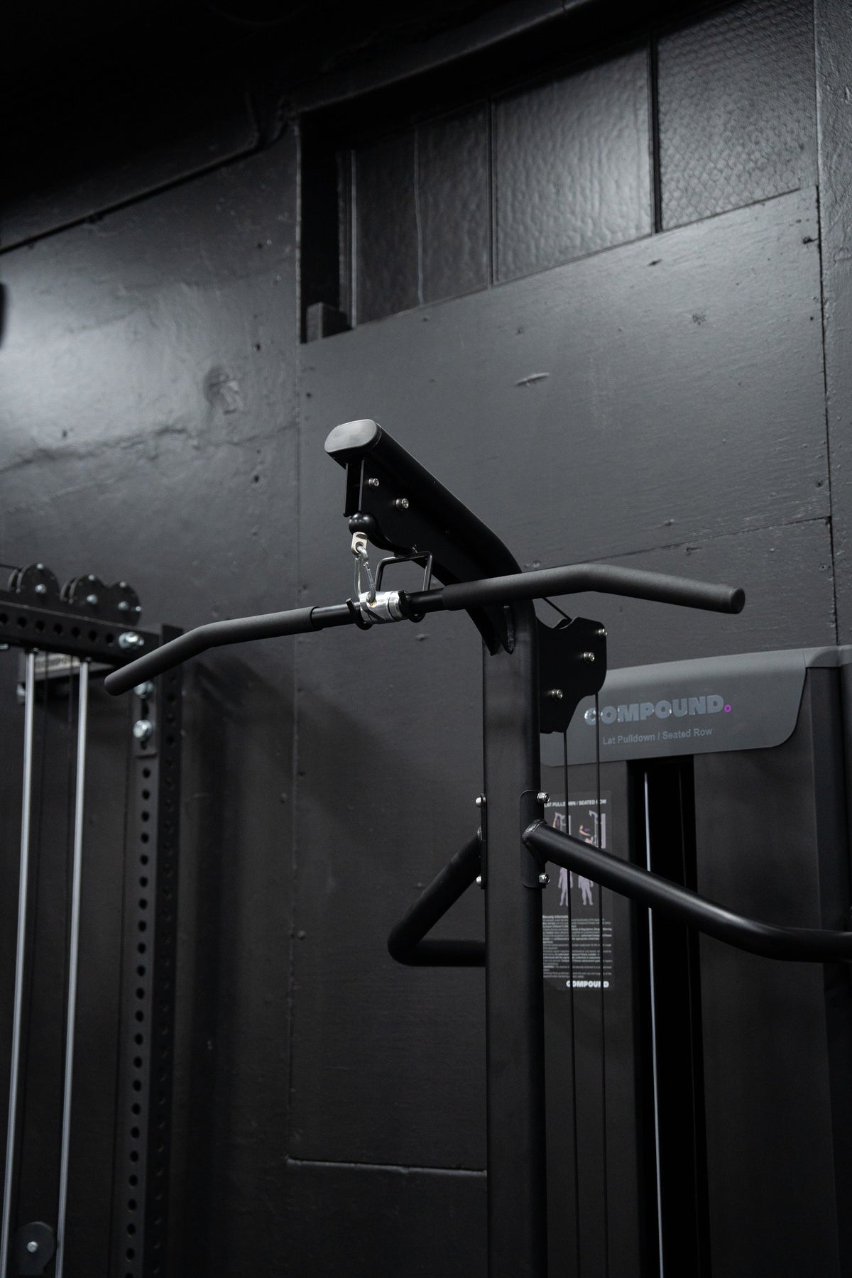 Lat Pulldown / Seated Row - Dynasty side view showing compact footprint design